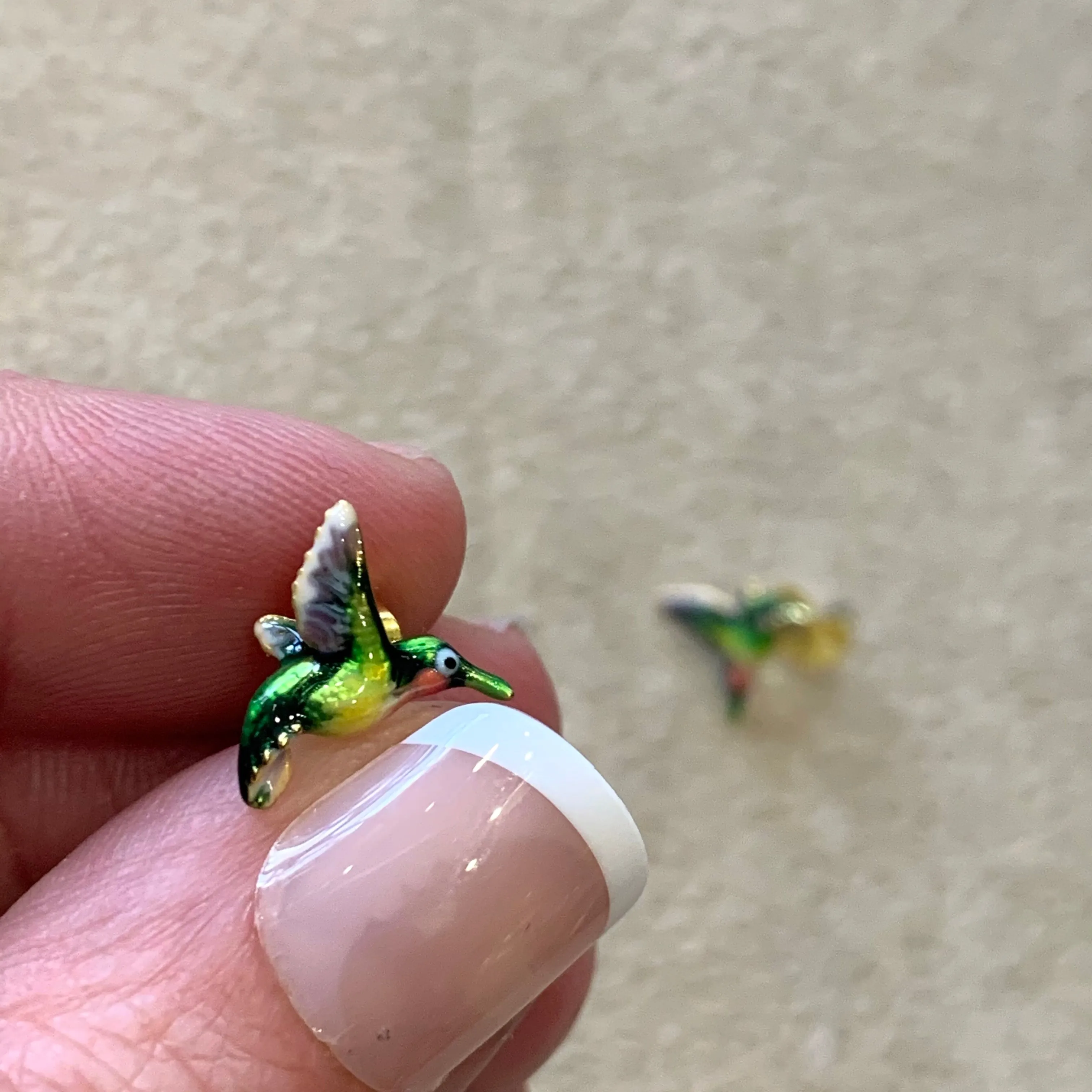 Hummingbird stud earrings by Bill Skinner in Enamel gold plated