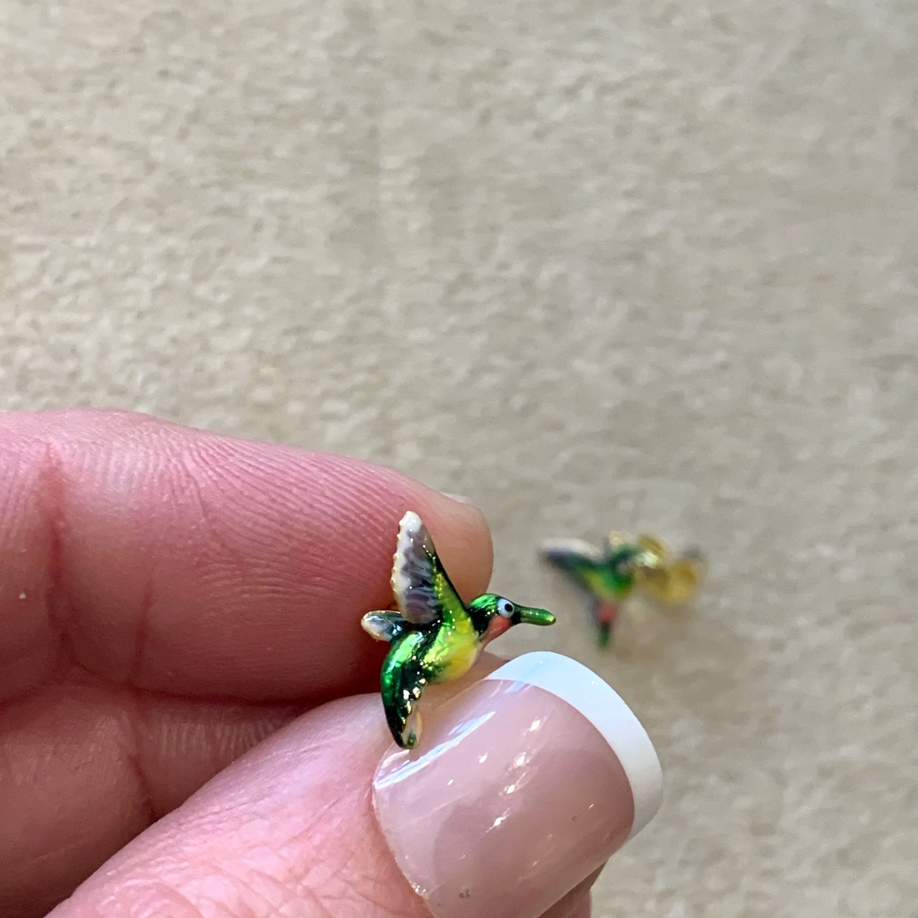 Hummingbird stud earrings by Bill Skinner in Enamel gold plated