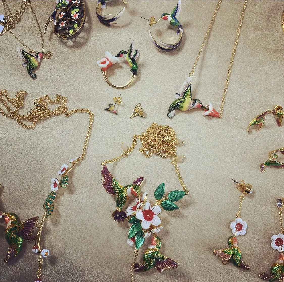 Hummingbird stud earrings by Bill Skinner in Enamel gold plated