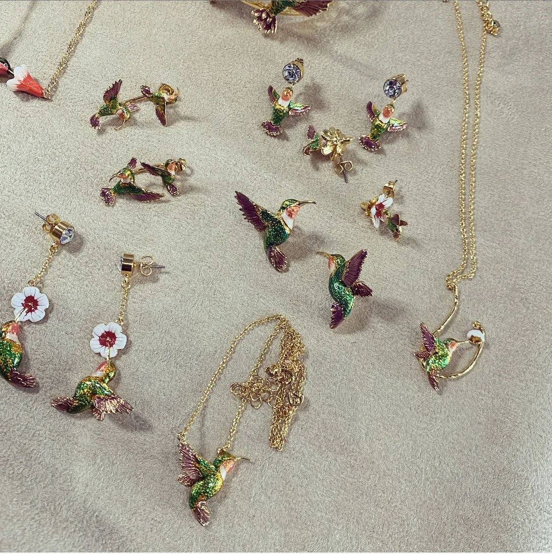 Hummingbird stud earrings by Bill Skinner in Enamel gold plated