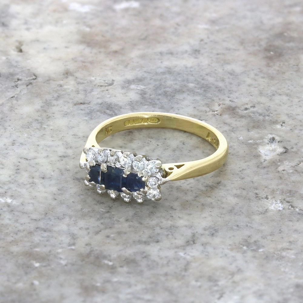 Pre Owned 18ct Yellow Gold Sapphire and 0.24cts Diamond Cluster Ring